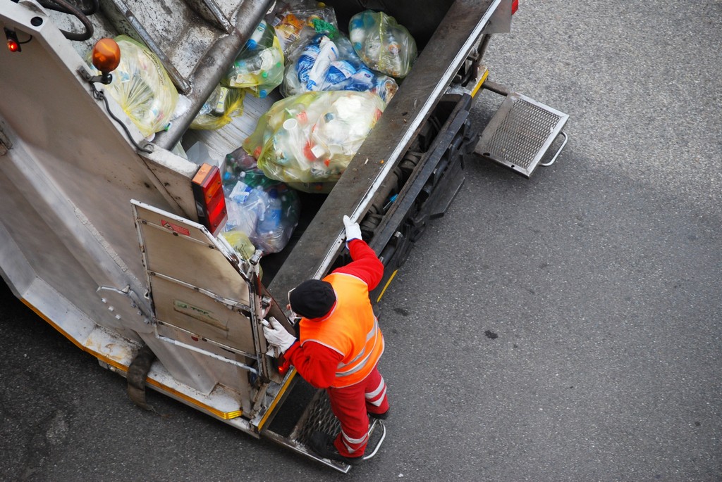 Garbage,Man,At,Work,On,The,Truck